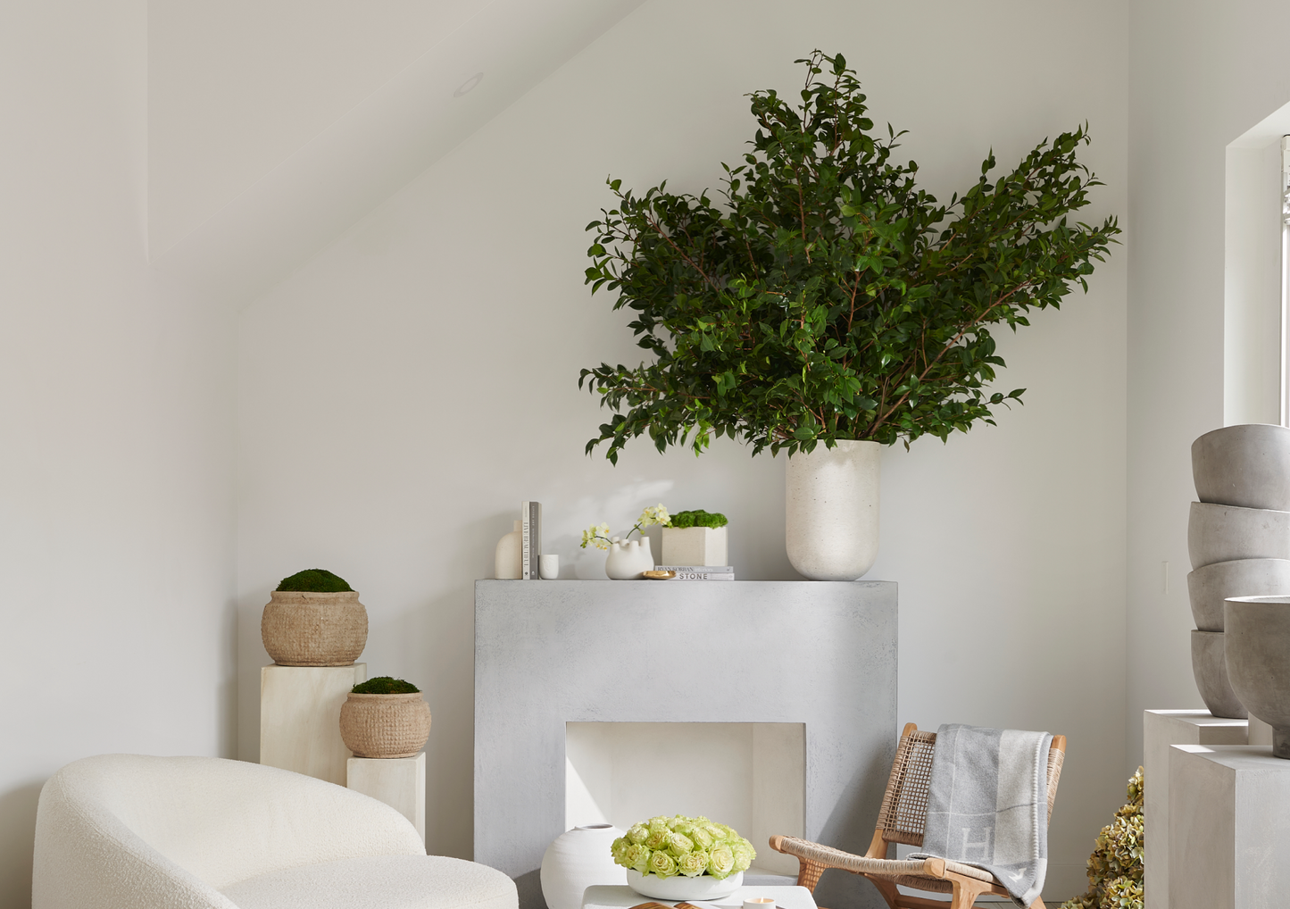 Luxurious faux interior plant displayed on the mantel in a luxury displayed setting.